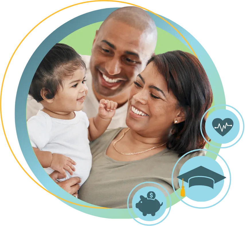 Man and woman smiling holding a baby